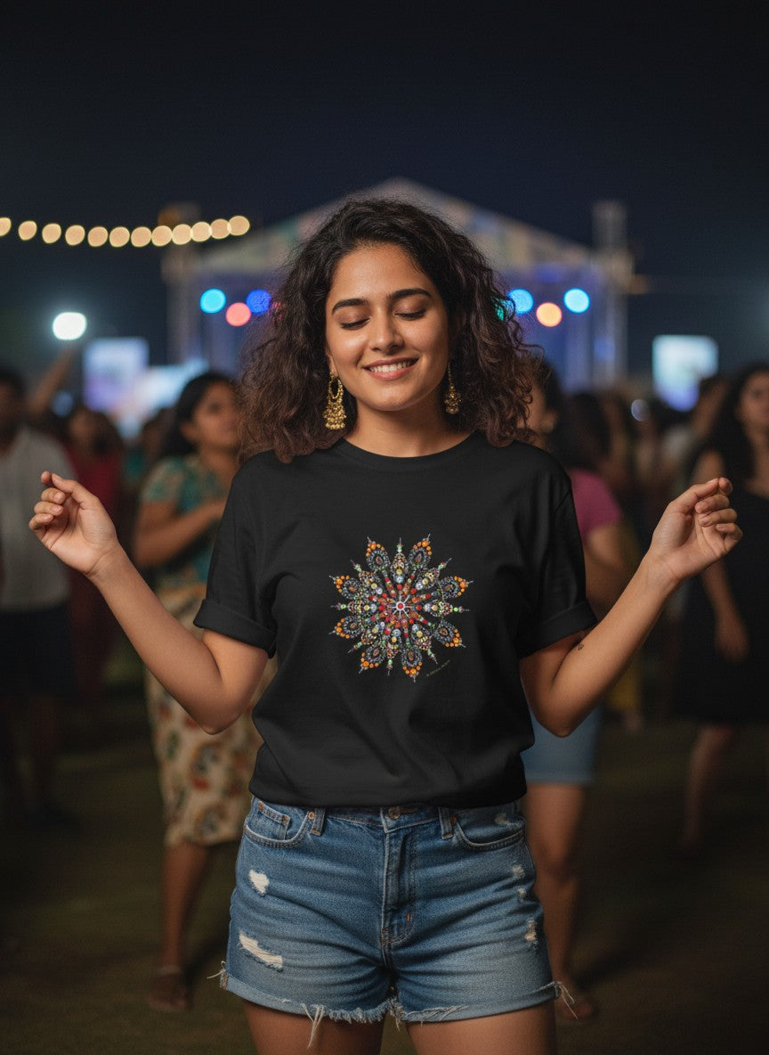 Young woman wearing Wheel of Time mandala print unisex black t-shirt bhajan clubbing India